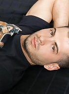 You are a voyeur, peeking in at the sexy jock stud Victor Cage as he works his body in the gym and then works his rock hard cock in the process.