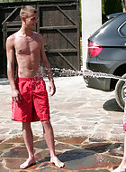 Jake and Jason are out in the hot sun, its so warm they decide to spray each other off with the hose to cool down a little. They are soon tugging down each others shorts and chasing around naked playing in the water.